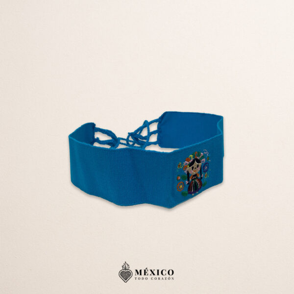 Handcrafted light blue faja Mexican waist belt featuring mini Mexican doll embroidery