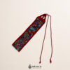 Handcrafted red Mexican waist belt (faja) featuring embroidered butterflies and flowers