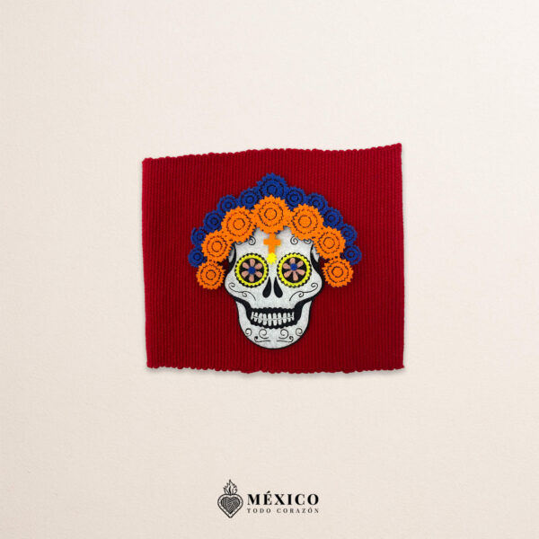 Red artisan Mexican waist belt featuring a Catrina felt appliqué