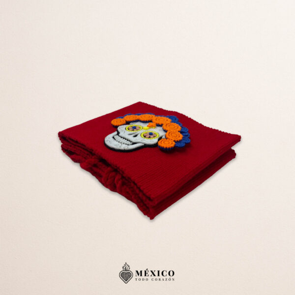 Red artisan Mexican waist belt featuring a Catrina felt appliqué