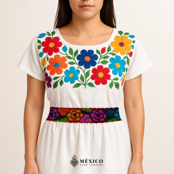 Handwoven Mexican waist belt (faja) featuring colorful flower embellishments and orange ties