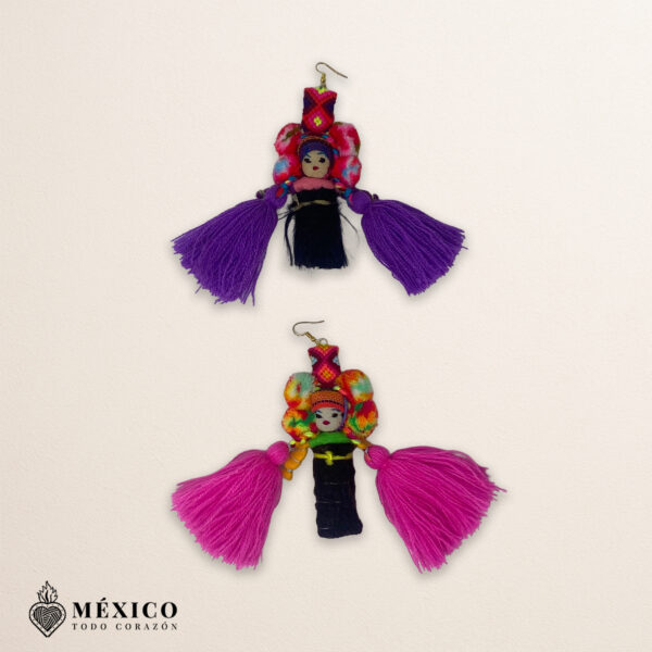 Handmade pink and purple Mexican dolls earrings featuring multicolor yarn pom-pom embellishments
