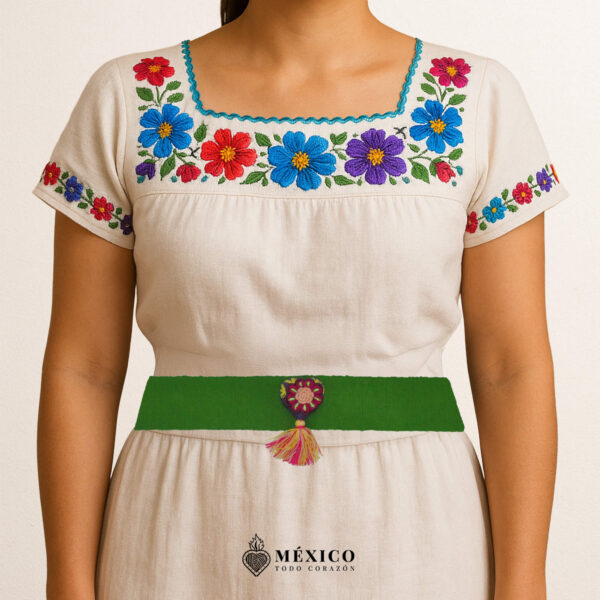 Green artisan Mexican waist belt featuring a floral heart embellishment in multicolor felt