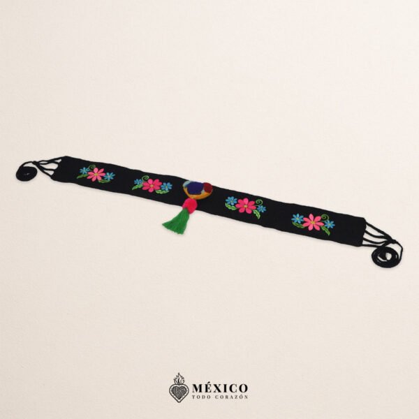 Black artisan waist belt featuring floral embroidery and a heart-shaped felt embellishment
