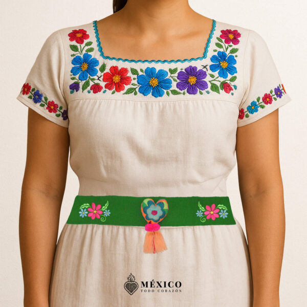Green Mexican waist belt featuring floral embroidery and a heart embellishment in felt