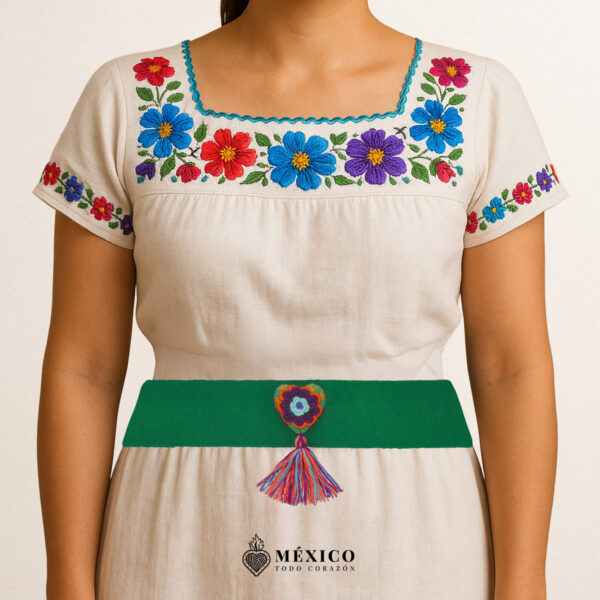Green artisan Mexican waist belt featuring a floral heart embellishment in felt appliqué