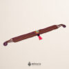 Multicolor striped artisan waist belt featuring a floral heart embellishment in felt