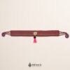 Multicolor striped artisan waist belt featuring a floral heart embellishment in felt