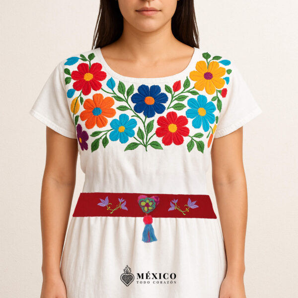 Red artisan waist belt featuring floral embroidery and a heart embellishment in felt appliqué