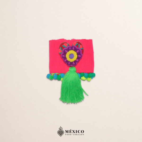 Pink artisan waist belt featuring a floral heart embellishment with pom-poms in felt appliqué