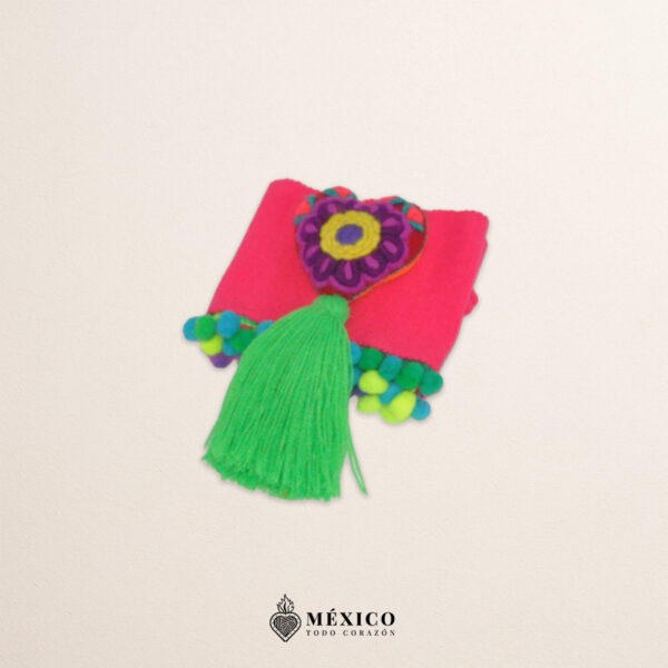Pink artisan waist belt featuring a floral heart embellishment with pom-poms in felt appliqué