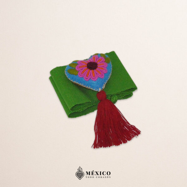 Green artisan Mexican waist belt featuring a floral heart embellishment in felt appliqué