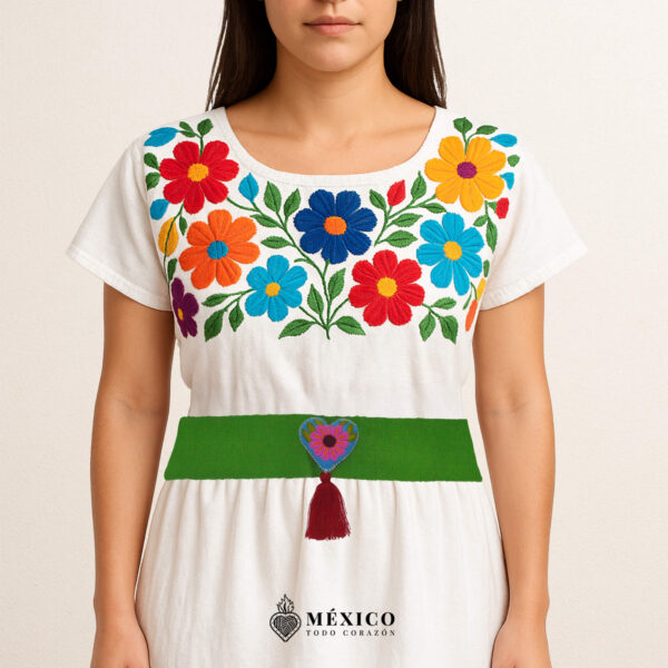 Green artisan Mexican waist belt featuring a floral heart embellishment in felt appliqué
