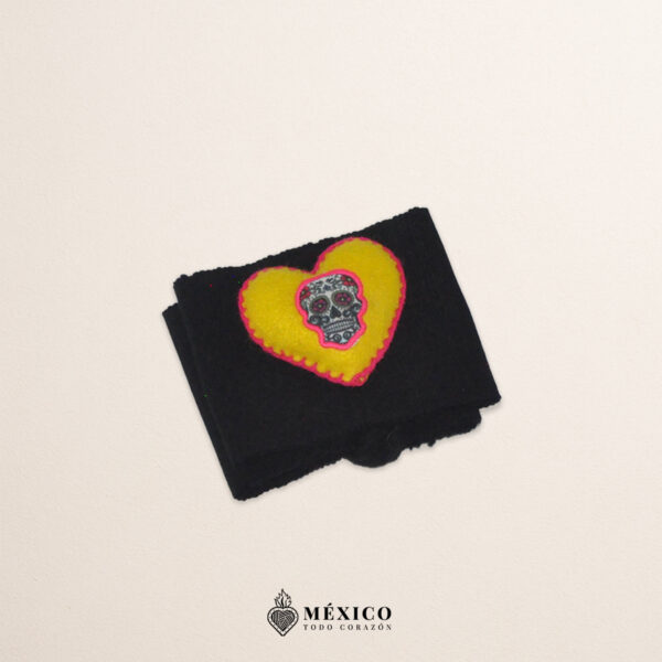 Black artisan waist belt featuring a heart with Catrina embellishment in felt appliqué