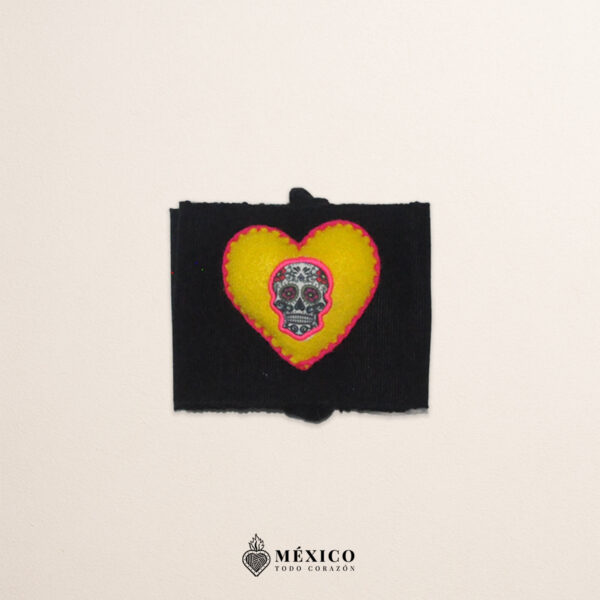 Black artisan waist belt featuring a heart with Catrina embellishment in felt appliqué