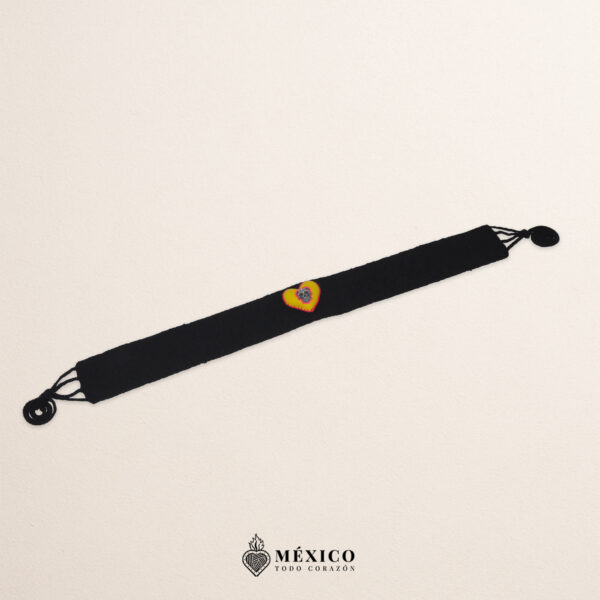 Black artisan waist belt featuring a heart with Catrina embellishment in felt appliqué