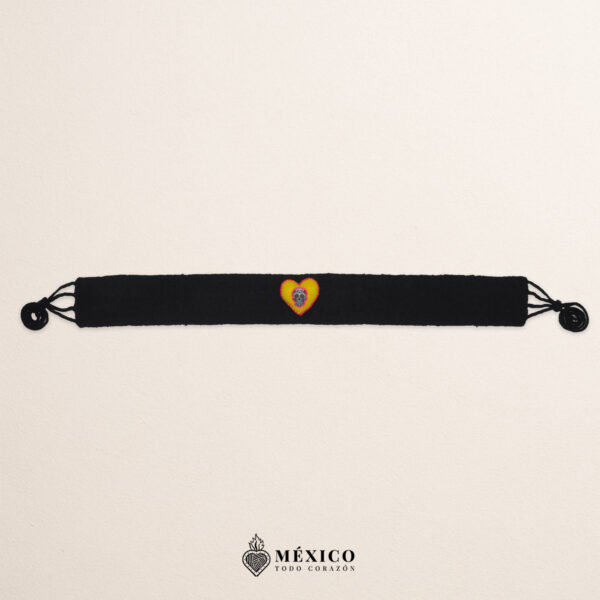 Black artisan waist belt featuring a heart with Catrina embellishment in felt appliqué