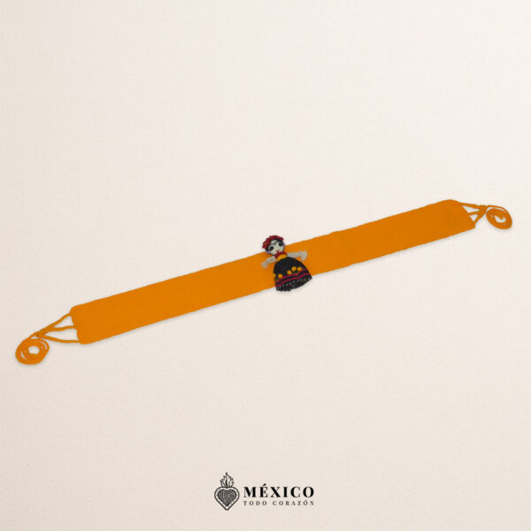 Yellow artisan Mexican waist belt featuring a Mexican doll embellishment in felt appliqué