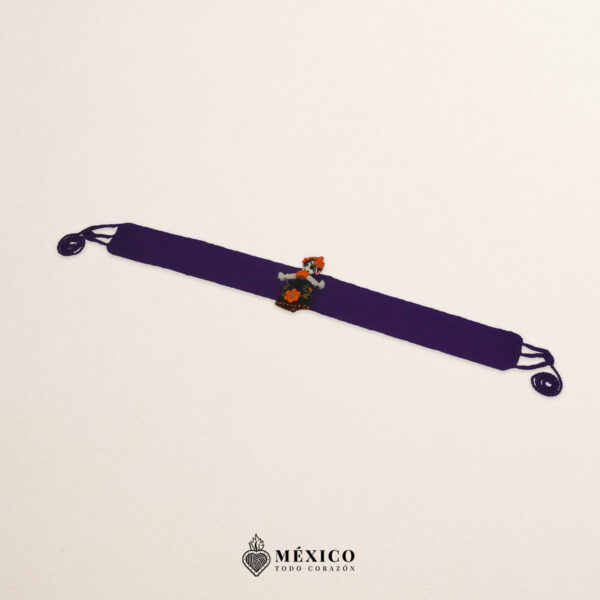 Purple artisan Mexican waist belt featuring a Mexican doll embellishment in felt appliqué