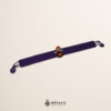 Purple artisan Mexican waist belt featuring a Mexican doll embellishment in felt appliqué