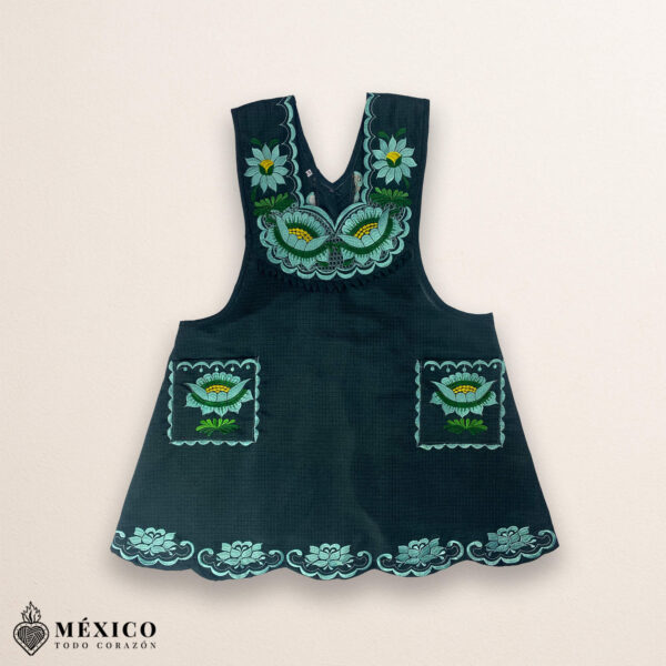 Mint green Mexican embroidered cotton apron featuring floral motifs, ideal cooking gift