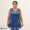 Blue Mexican embroidered cotton apron featuring floral and bird motifs, perfect kitchen and cooking gift