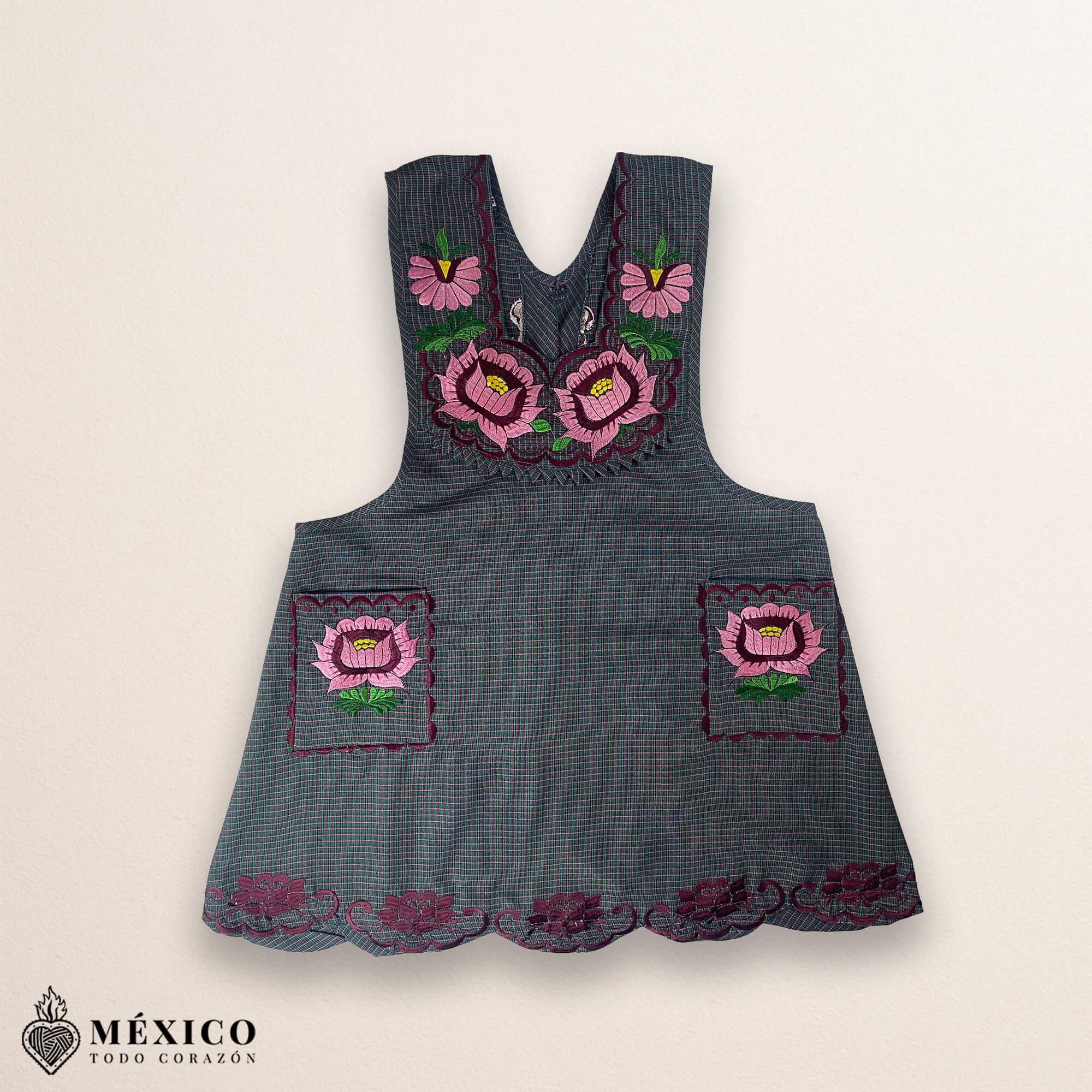 Gray Mexican embroidered cotton apron featuring pink floral design, perfect kitchen and cooking gift