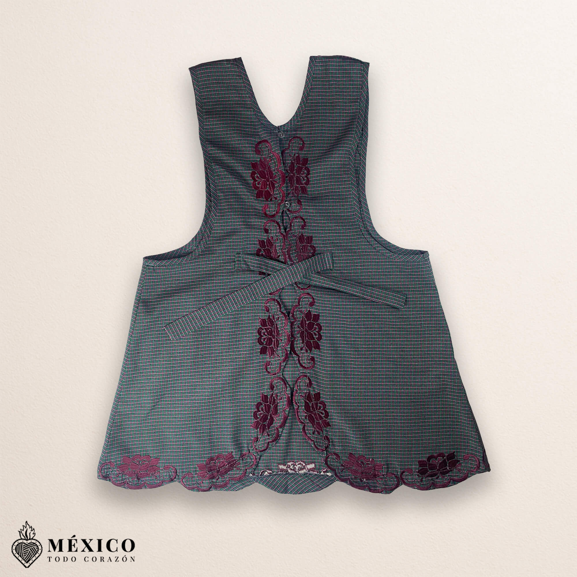 Gray Mexican embroidered cotton apron featuring pink floral design, perfect kitchen and cooking gift