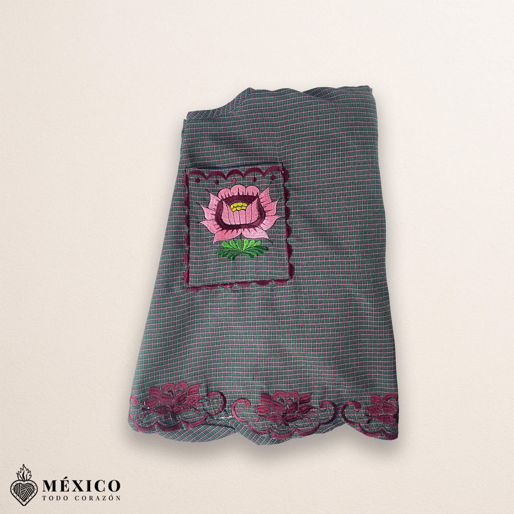 Gray Mexican embroidered cotton apron featuring pink floral design, perfect kitchen and cooking gift