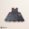 Gray Mexican embroidered cotton apron featuring pink floral design, perfect kitchen and cooking gift