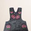 Gray Mexican embroidered cotton apron featuring pink floral design, perfect kitchen and cooking gift