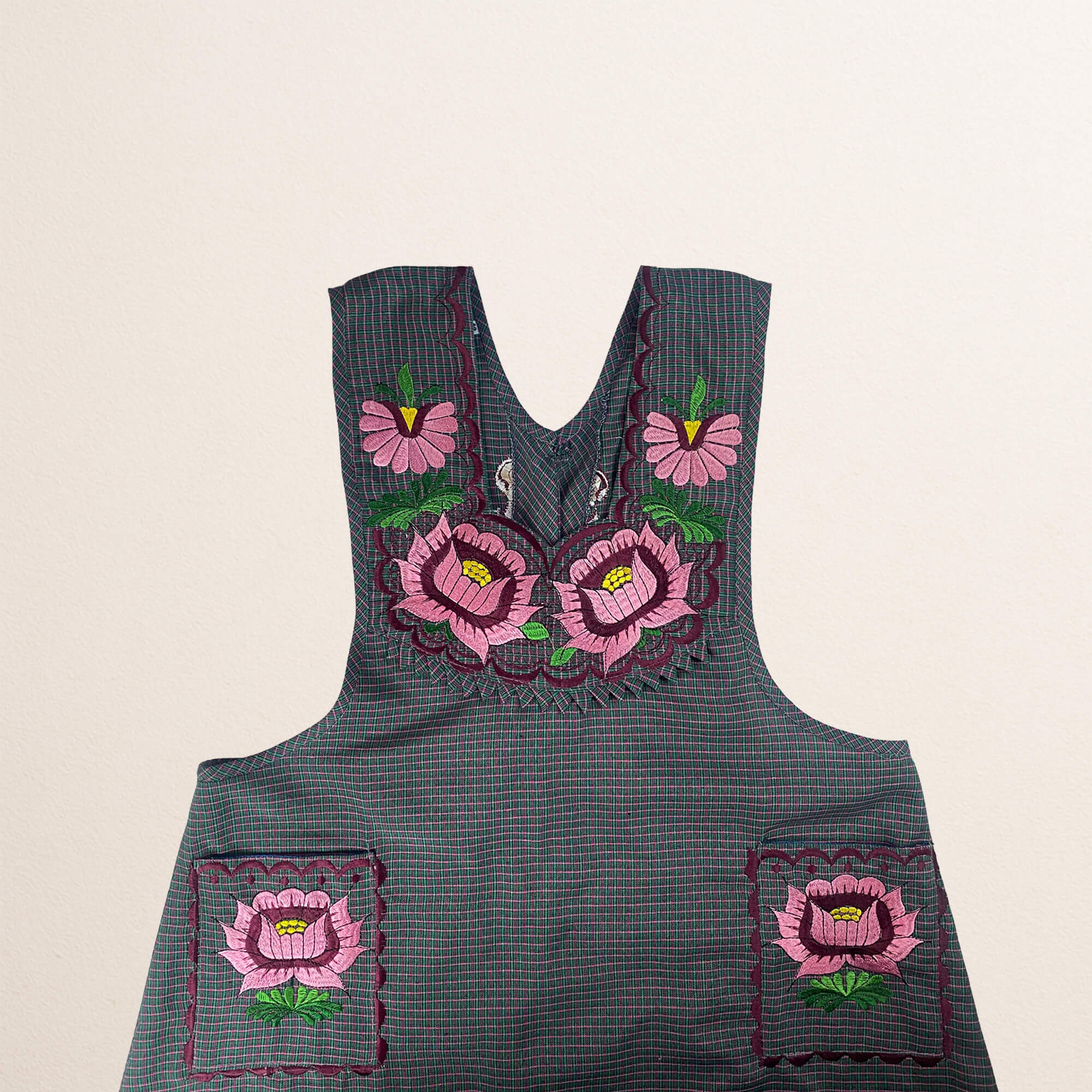 Gray Mexican embroidered cotton apron featuring pink floral design, perfect kitchen and cooking gift