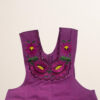 Burgundy Mexican embroidered cotton apron featuring floral motifs, ideal kitchen and cooking gift
