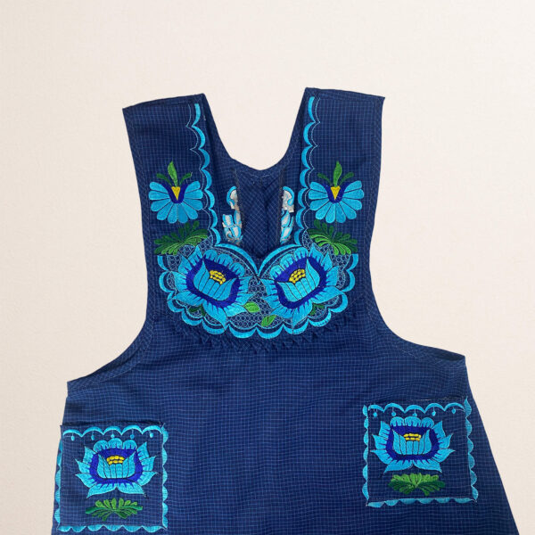 Blue Mexican embroidered cotton apron featuring light blue floral design, perfect kitchen and cooking gift