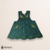 Green Mexican embroidered cotton apron featuring an olive peacock design, perfect kitchen and cooking gift