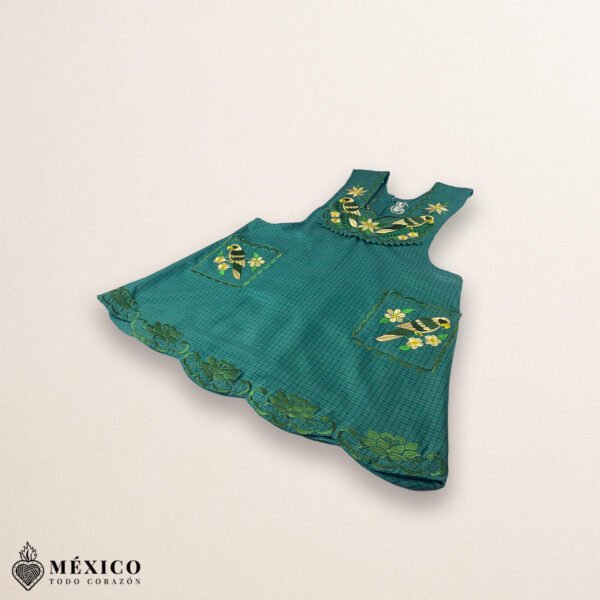 Green Mexican embroidered cotton apron featuring floral and bird motifs, perfect kitchen and cooking gift