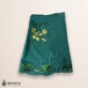 Green Mexican embroidered cotton apron featuring floral and bird motifs, perfect kitchen and cooking gift