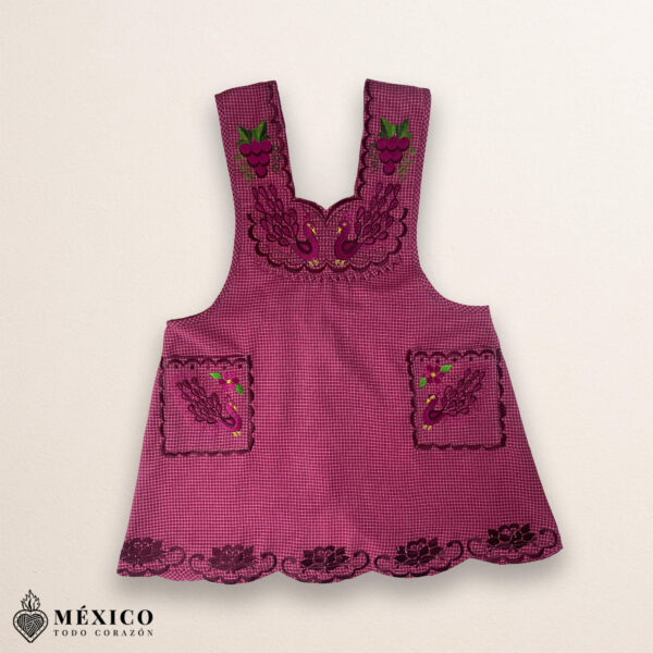 Burgundy Mexican embroidered cotton apron featuring grape fruit and peacock design, perfect kitchen gift