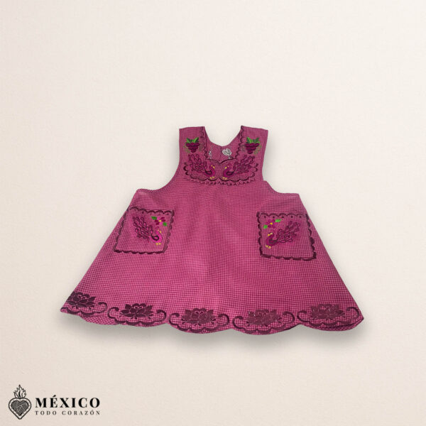 Burgundy Mexican embroidered cotton apron featuring grape fruit and peacock design, perfect kitchen gift