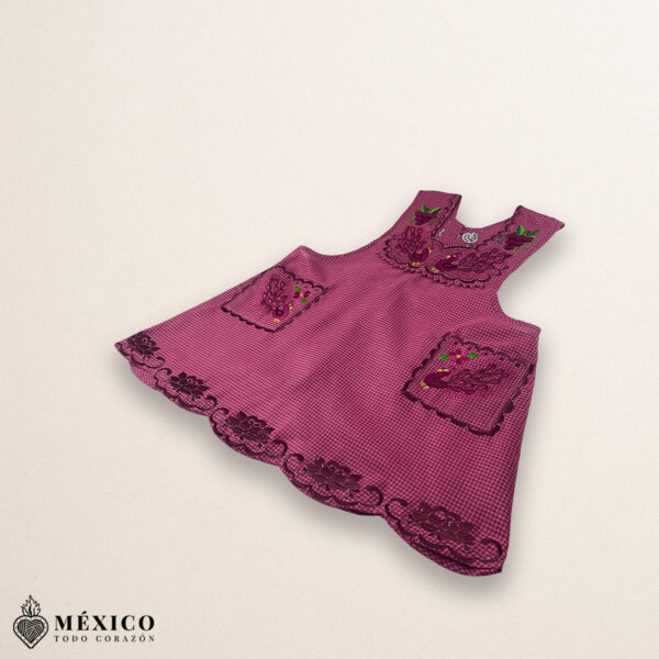 Burgundy Mexican embroidered cotton apron featuring grape fruit and peacock design, perfect kitchen gift