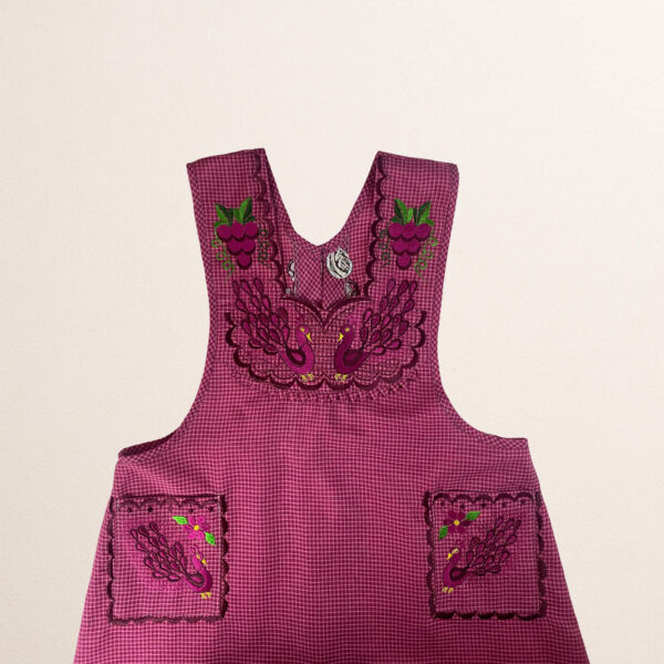 Burgundy Mexican embroidered cotton apron featuring grape fruit and peacock design, perfect kitchen gift