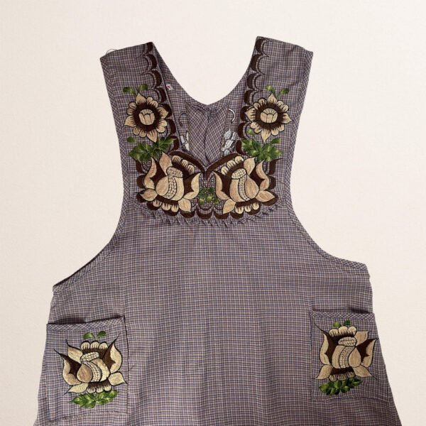 Light brown Mexican embroidered cotton apron featuring beige floral patterns, ideal kitchen and cooking gift.
