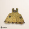 Yellow Mexican embroidered cotton apron with brown accent floral design, perfect kitchen gift
