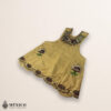 Yellow Mexican embroidered cotton apron with brown accent floral design, perfect kitchen gift