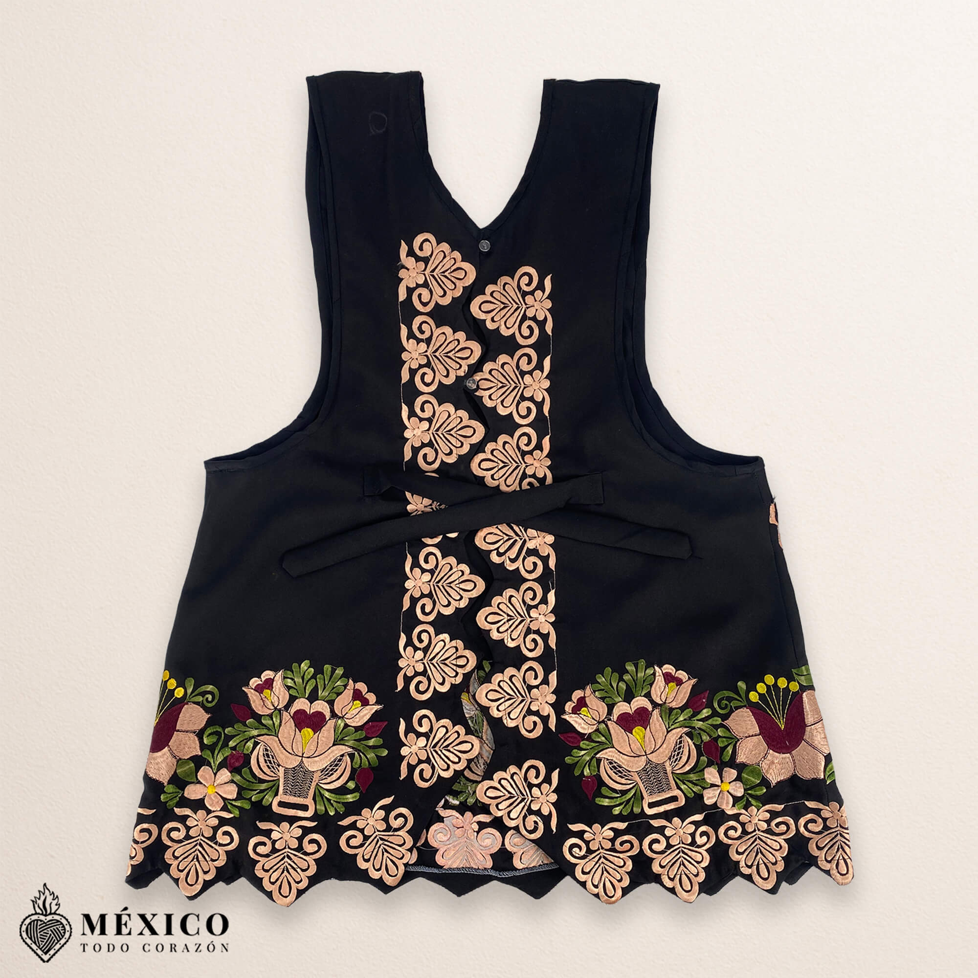 Black Mexican embroidered premium cotton blend apron featuring a beige floral design