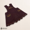 Dark burgundy Mexican embroidered essential cotton blend kitchen apron featuring a daisy floral design