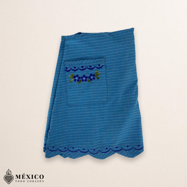 Light blue Mexican embroidered essential cotton blend kitchen apron featuring a daisy floral design