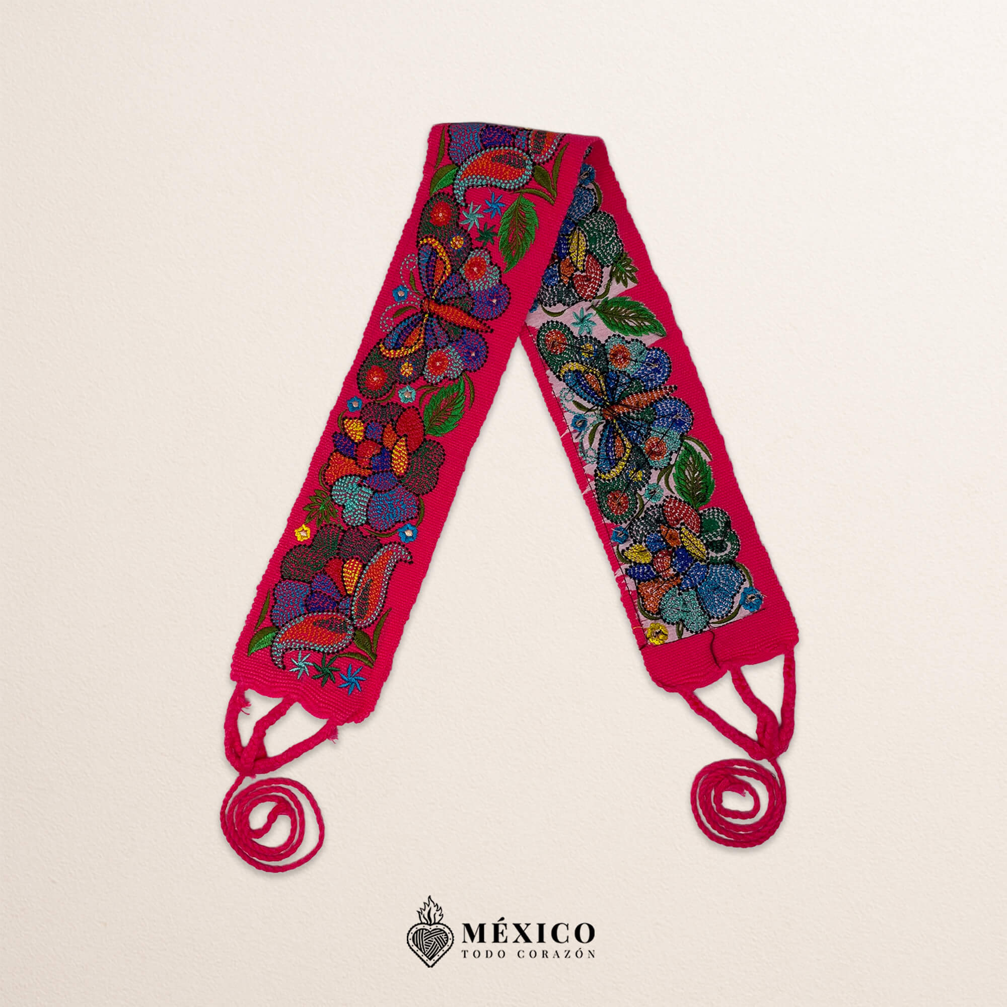 Pink embroidered Mexican waist belt featuring a floral and butterfly design