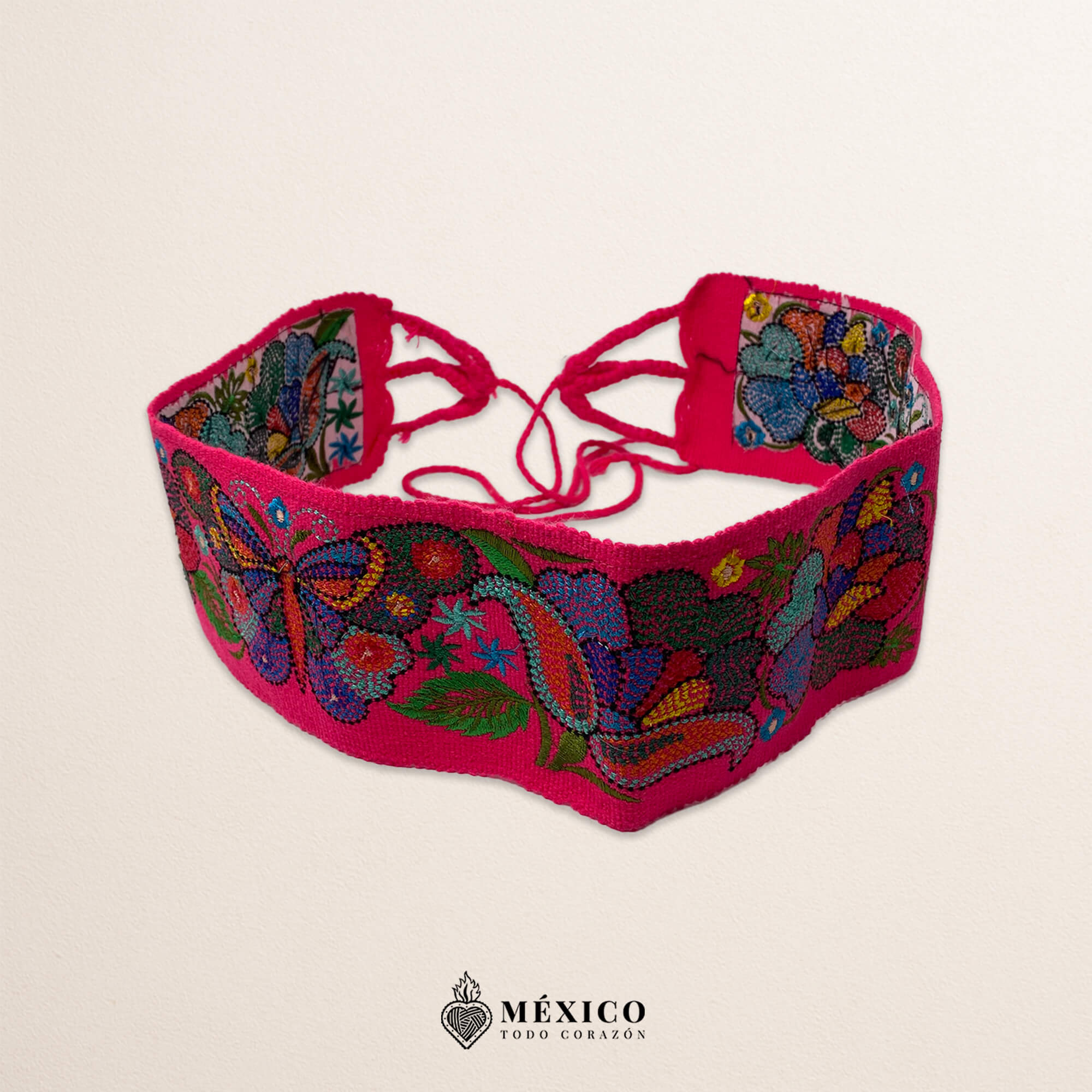 Pink embroidered Mexican waist belt featuring a floral and butterfly design