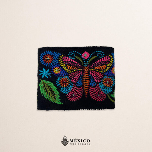 Black embroidered Mexican waist belt featuring a floral and butterfly design